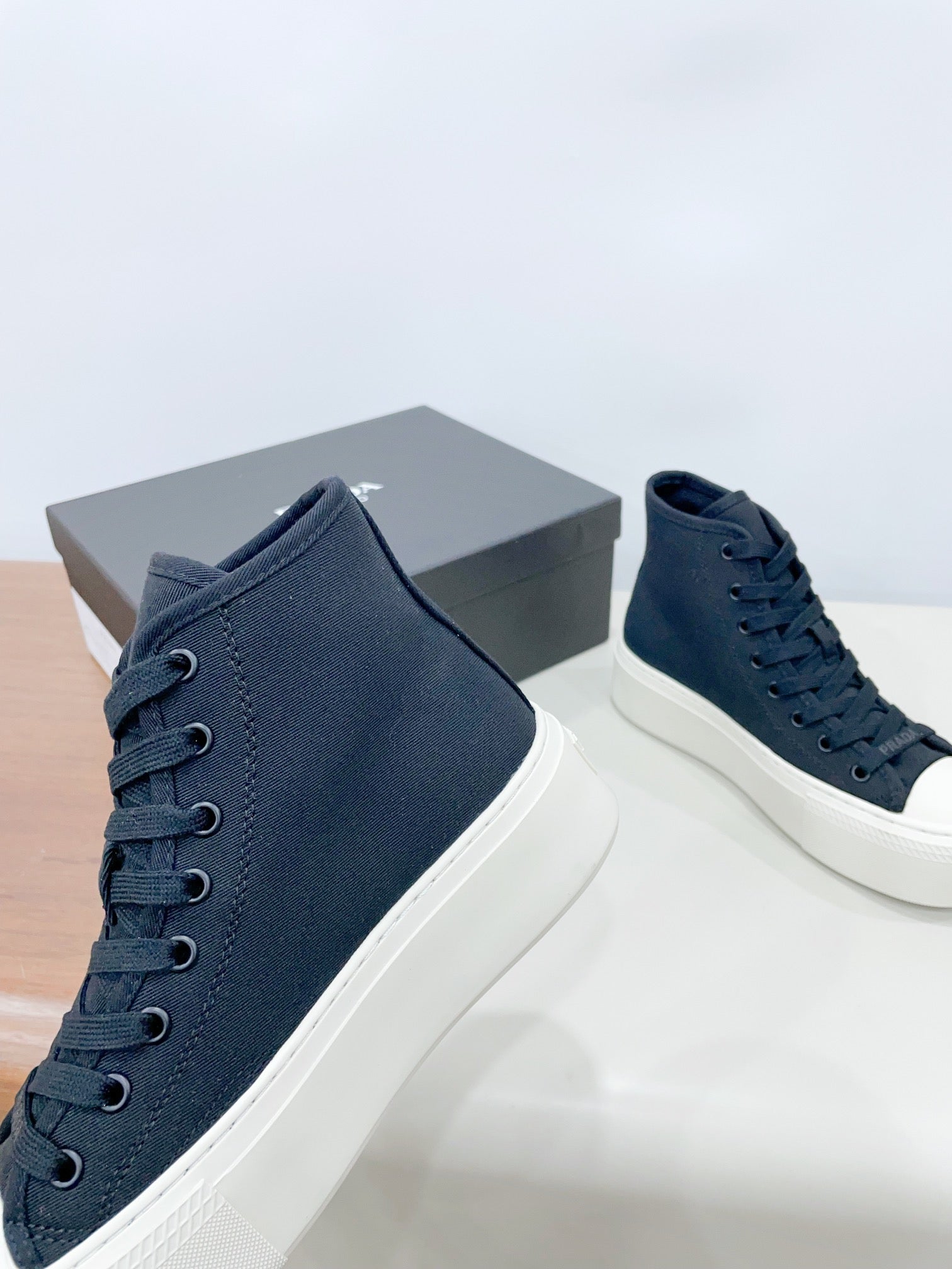 PRADA HIGH-TOP SEANKERS IN SPACE BLUE CANVAS