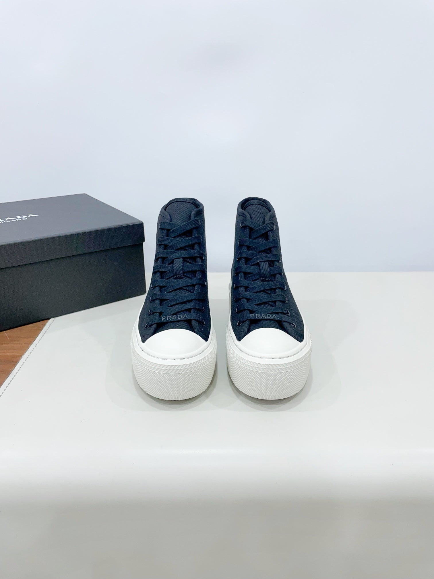 PRADA HIGH-TOP SEANKERS IN SPACE BLUE CANVAS