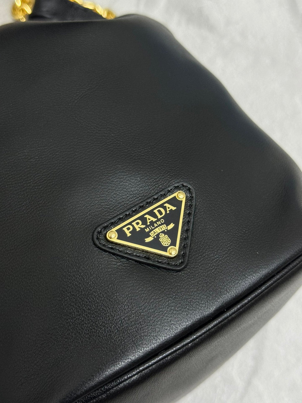 PRADA MINI BUCKET BAG 19 IN BLACK SOFT NAPPA LAMBSKIN GOLD HARDWARE