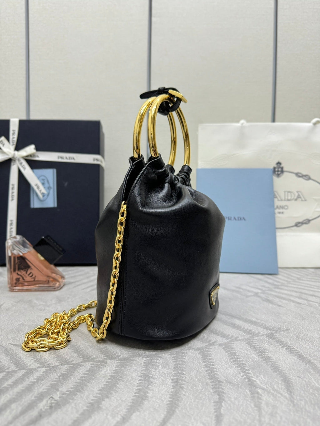 PRADA MINI BUCKET BAG 19 IN BLACK SOFT NAPPA LAMBSKIN GOLD HARDWARE