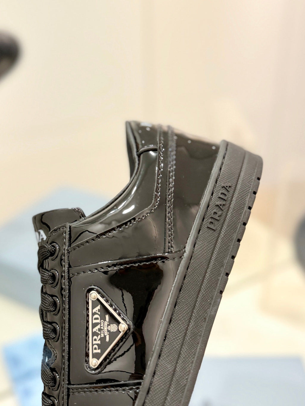 PRADA DOWNTOWN PERFORATED SNEAKERS GLOSSY BLACK CALFSKIN
