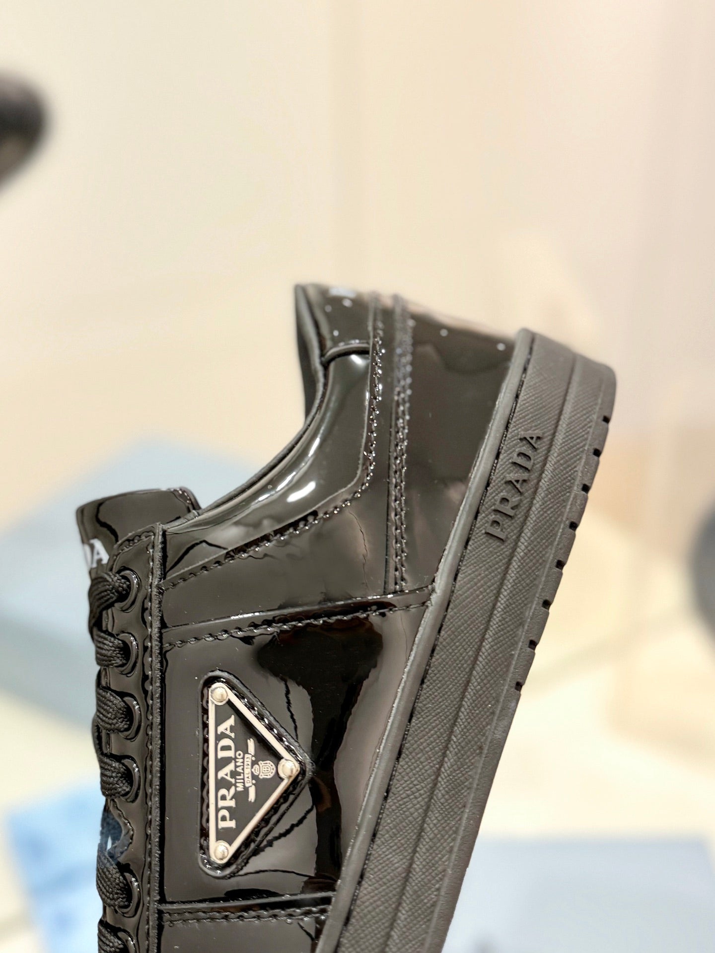 PRADA DOWNTOWN PERFORATED SNEAKERS GLOSSY BLACK CALFSKIN