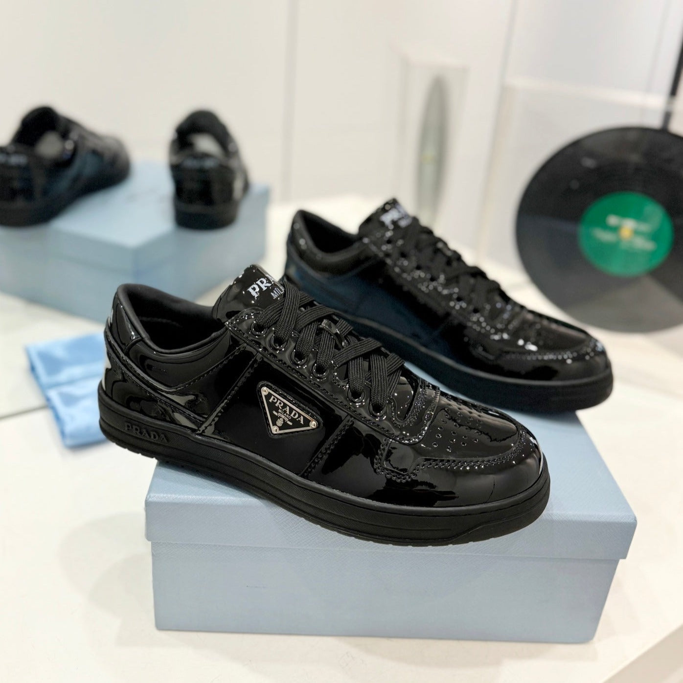 PRADA DOWNTOWN PERFORATED SNEAKERS GLOSSY BLACK CALFSKIN