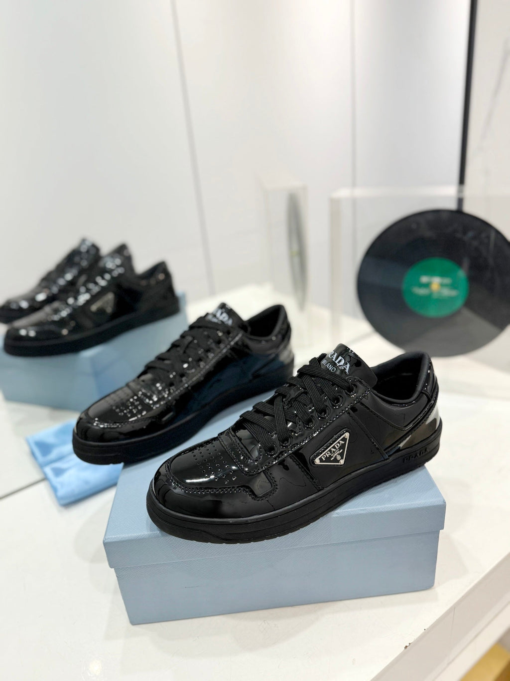 PRADA DOWNTOWN PERFORATED SNEAKERS GLOSSY BLACK CALFSKIN
