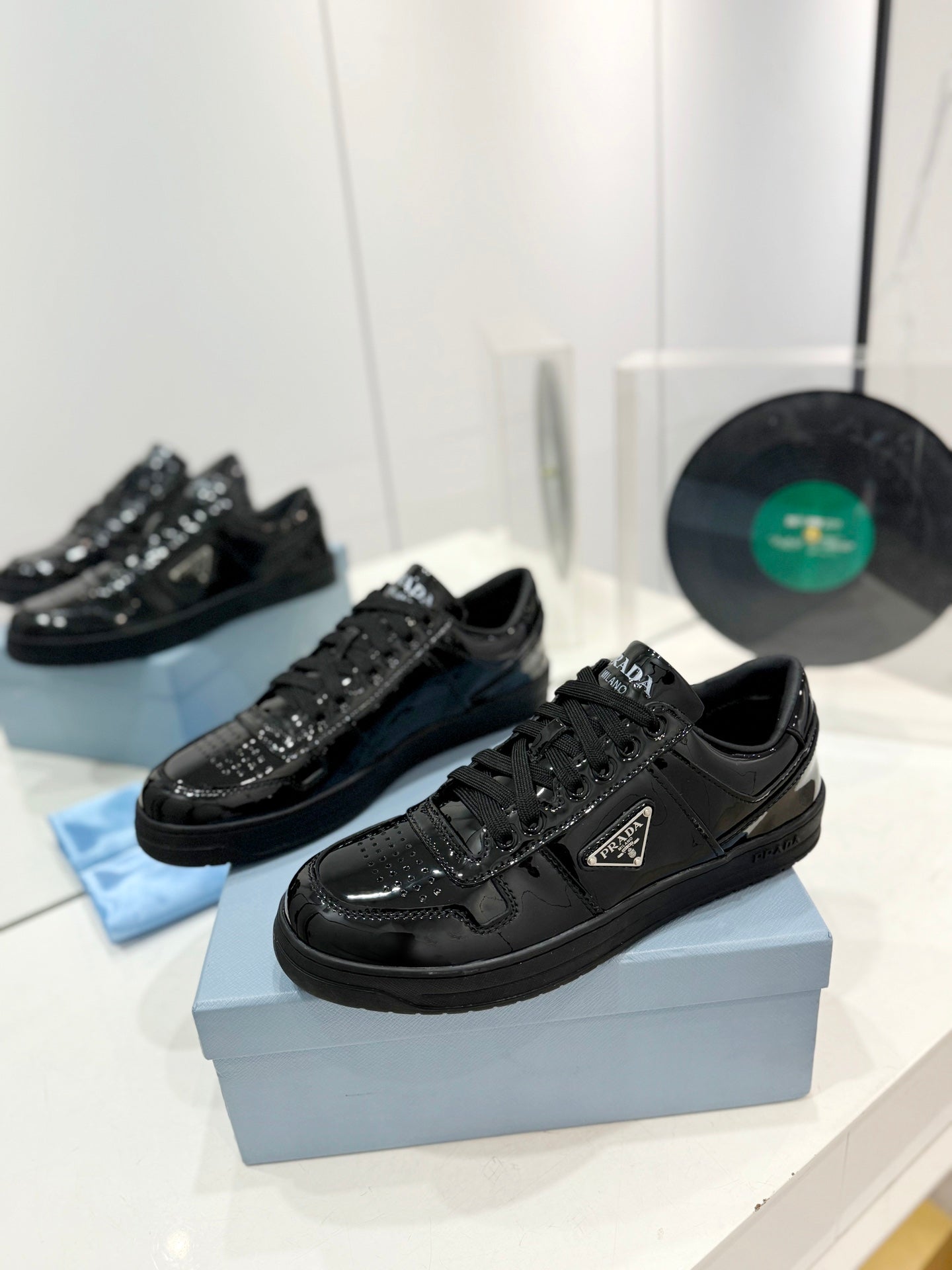PRADA DOWNTOWN PERFORATED SNEAKERS GLOSSY BLACK CALFSKIN