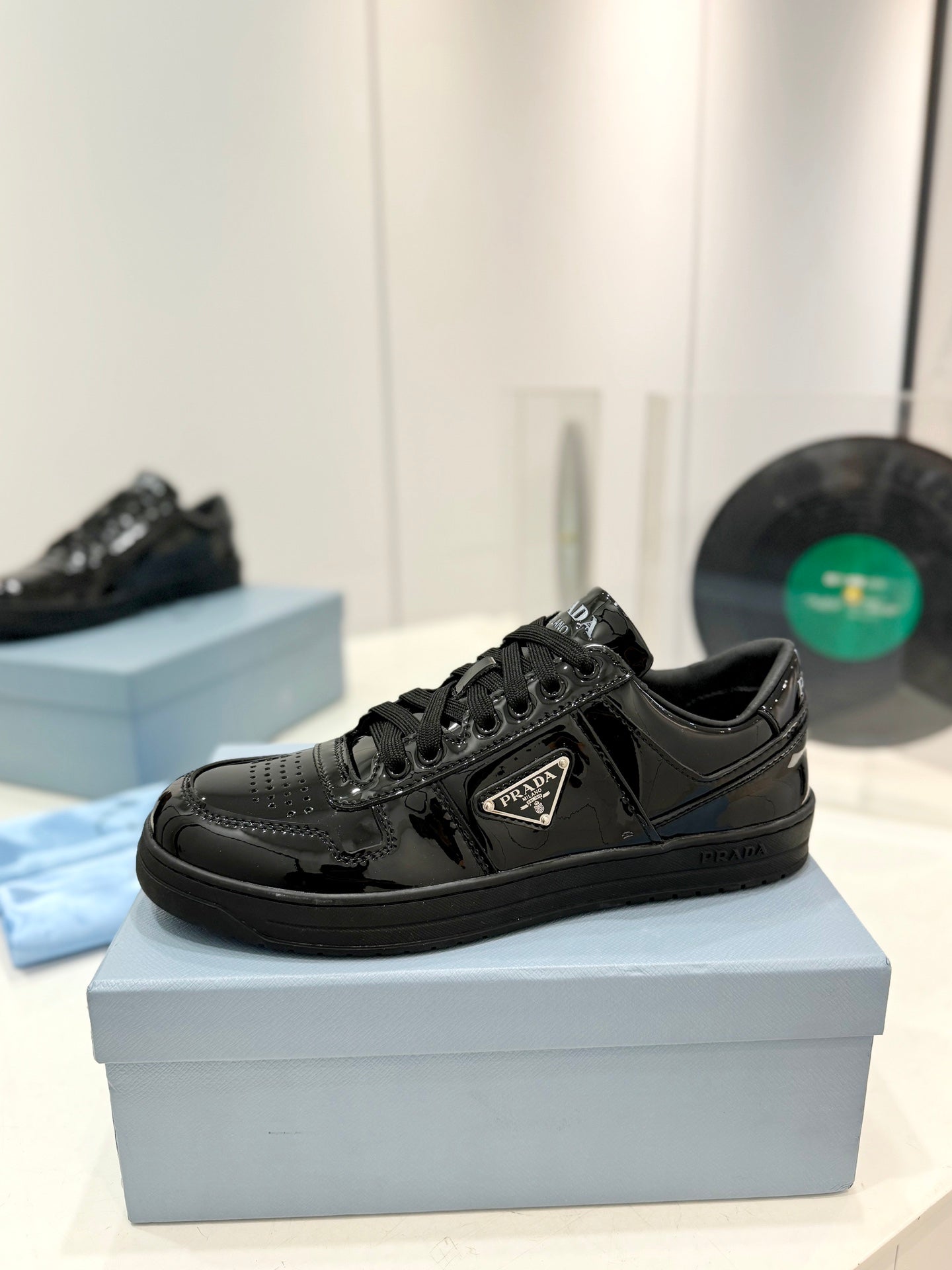 PRADA DOWNTOWN PERFORATED SNEAKERS GLOSSY BLACK CALFSKIN