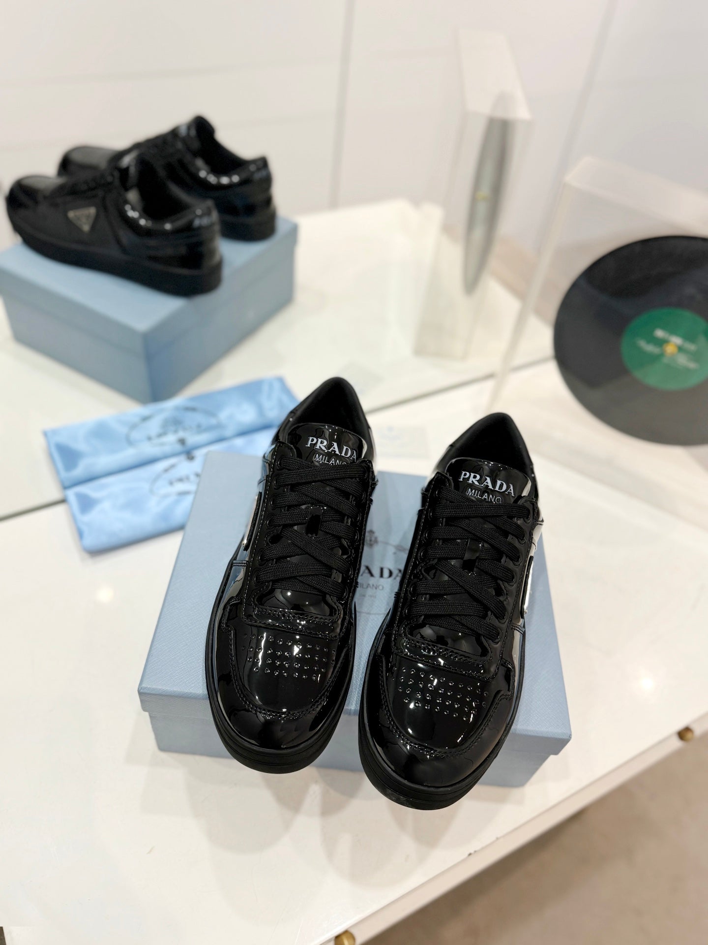PRADA DOWNTOWN PERFORATED SNEAKERS GLOSSY BLACK CALFSKIN
