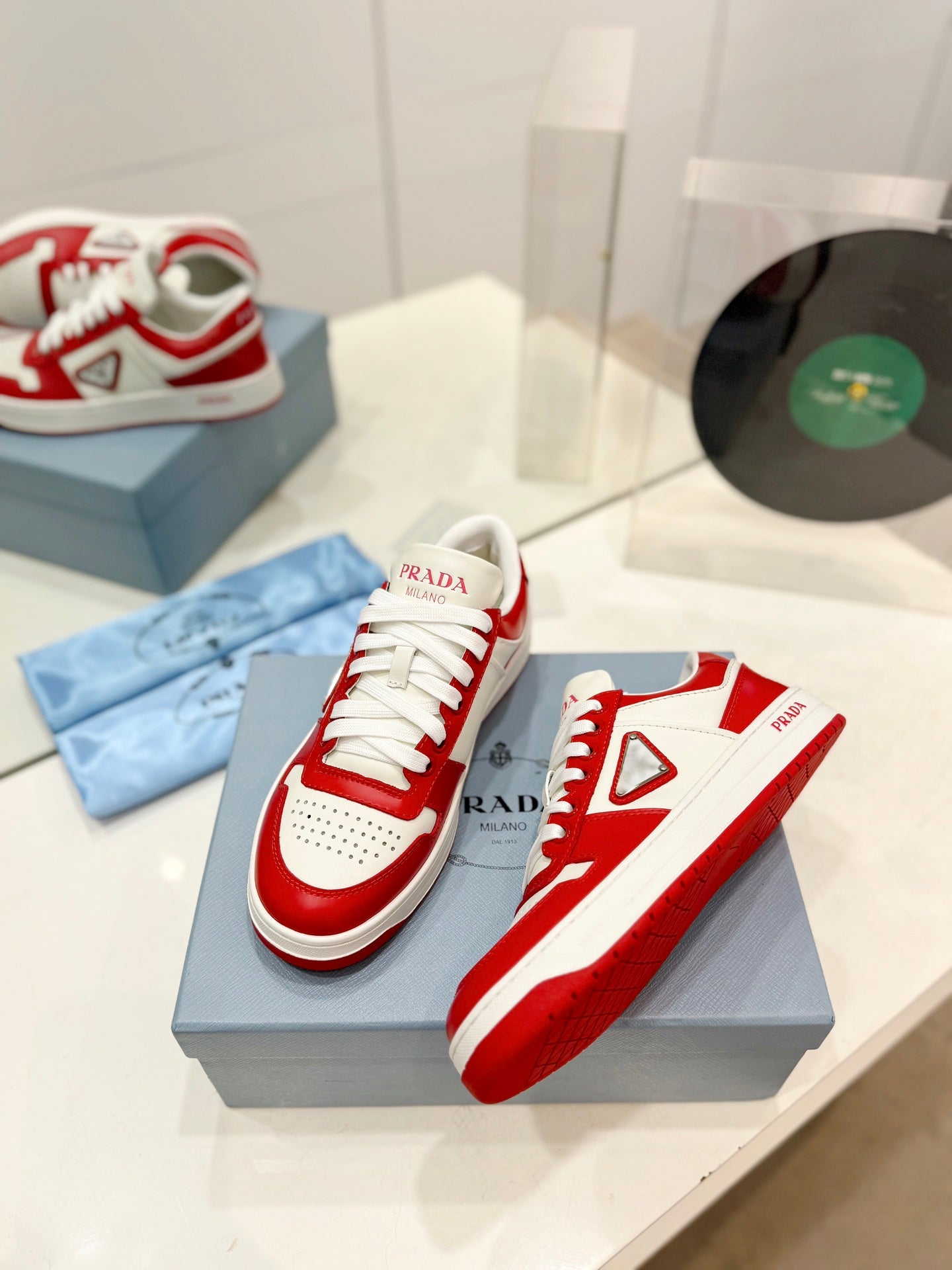 PRADA DOWNTOWN PERFORATED SNEAKERS WHITE AND RED CALFSKIN
