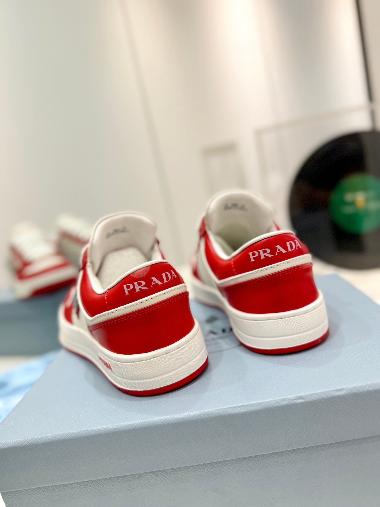 PRADA DOWNTOWN PERFORATED SNEAKERS WHITE AND RED CALFSKIN