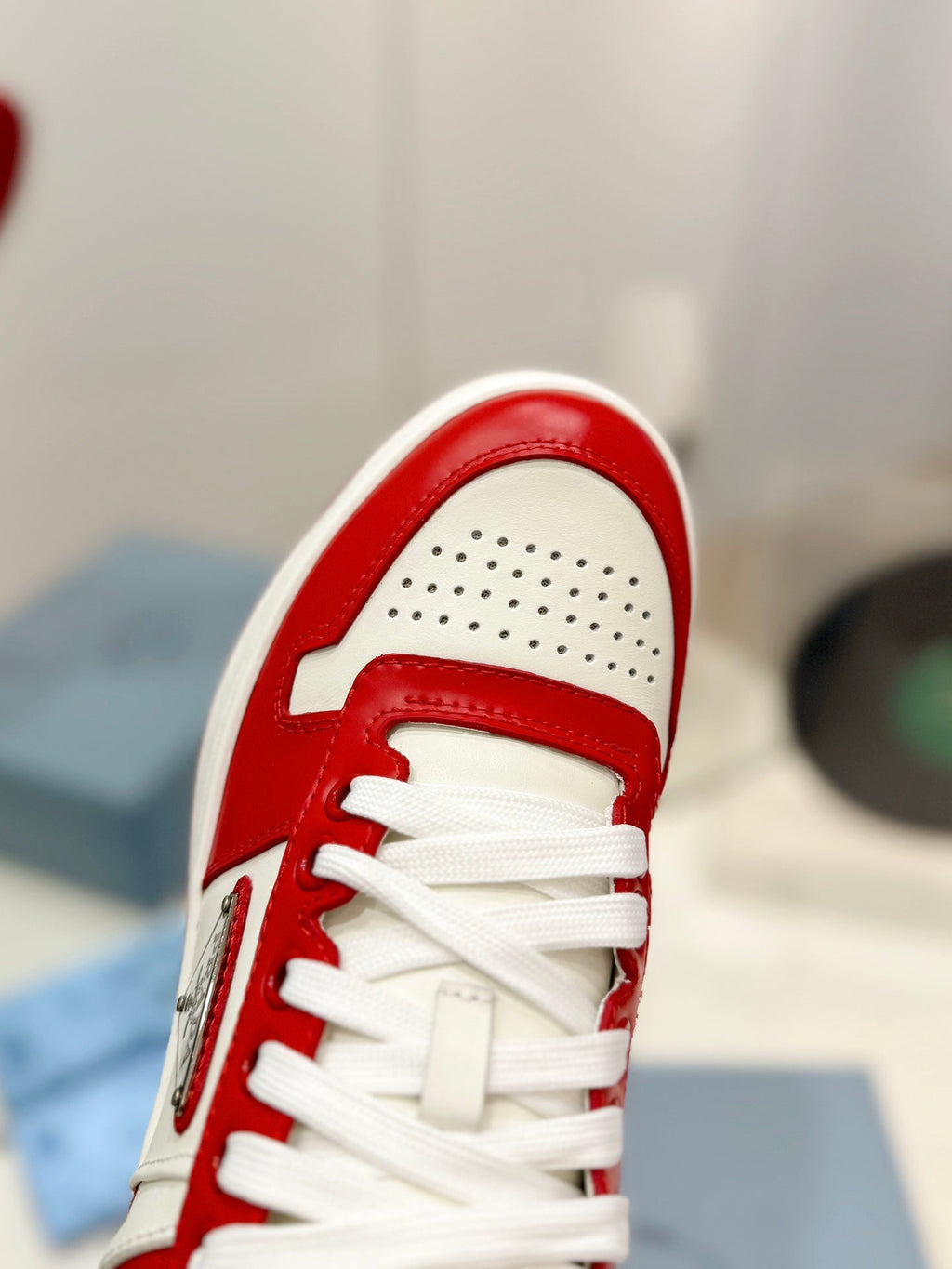 PRADA DOWNTOWN PERFORATED SNEAKERS WHITE AND RED CALFSKIN