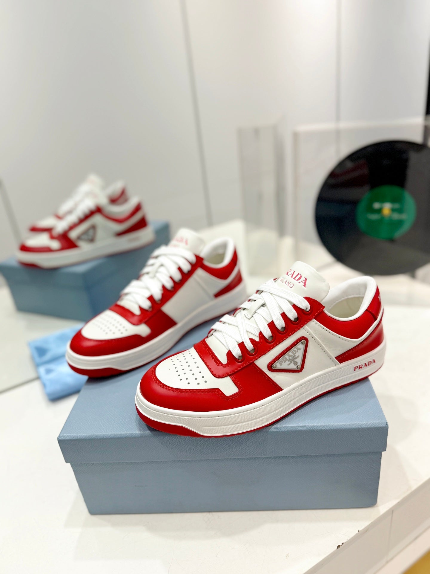 PRADA DOWNTOWN PERFORATED SNEAKERS WHITE AND RED CALFSKIN