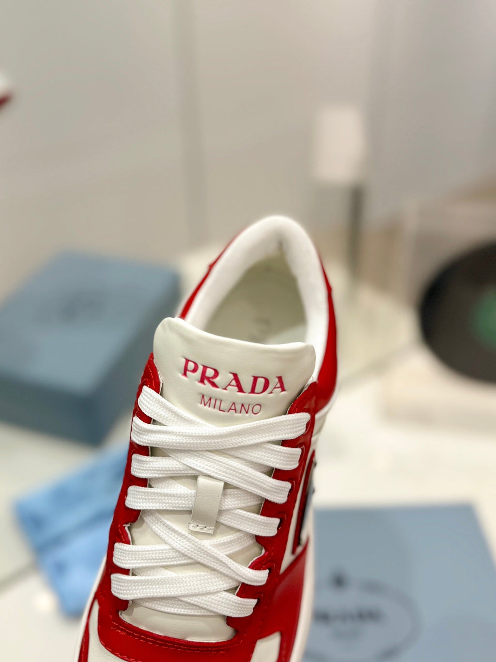 PRADA DOWNTOWN PERFORATED SNEAKERS WHITE AND RED CALFSKIN