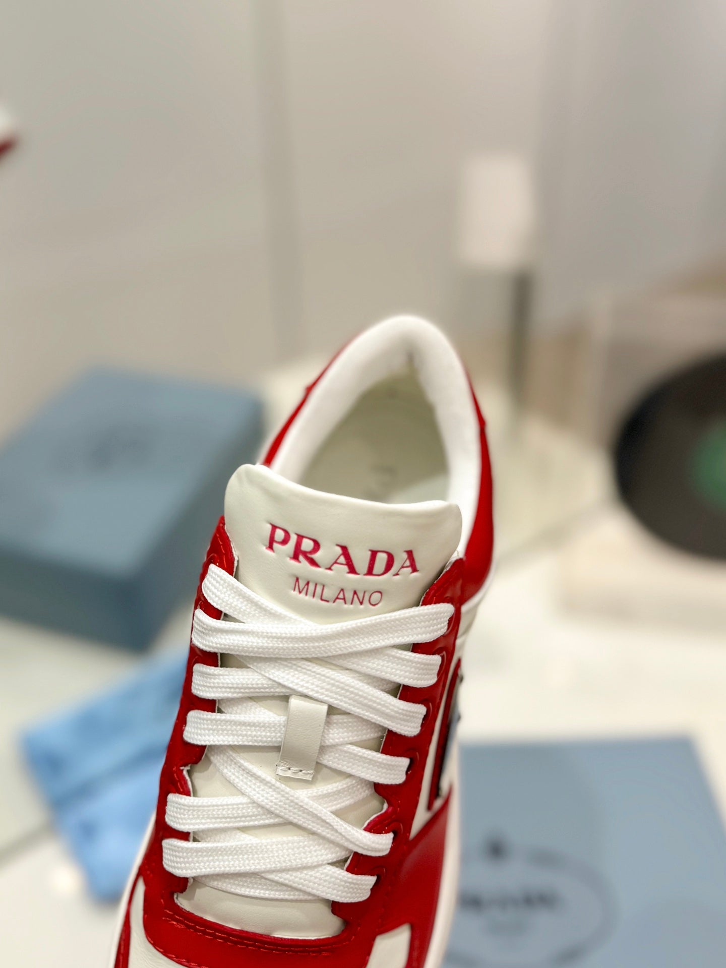 PRADA DOWNTOWN PERFORATED SNEAKERS WHITE AND RED CALFSKIN