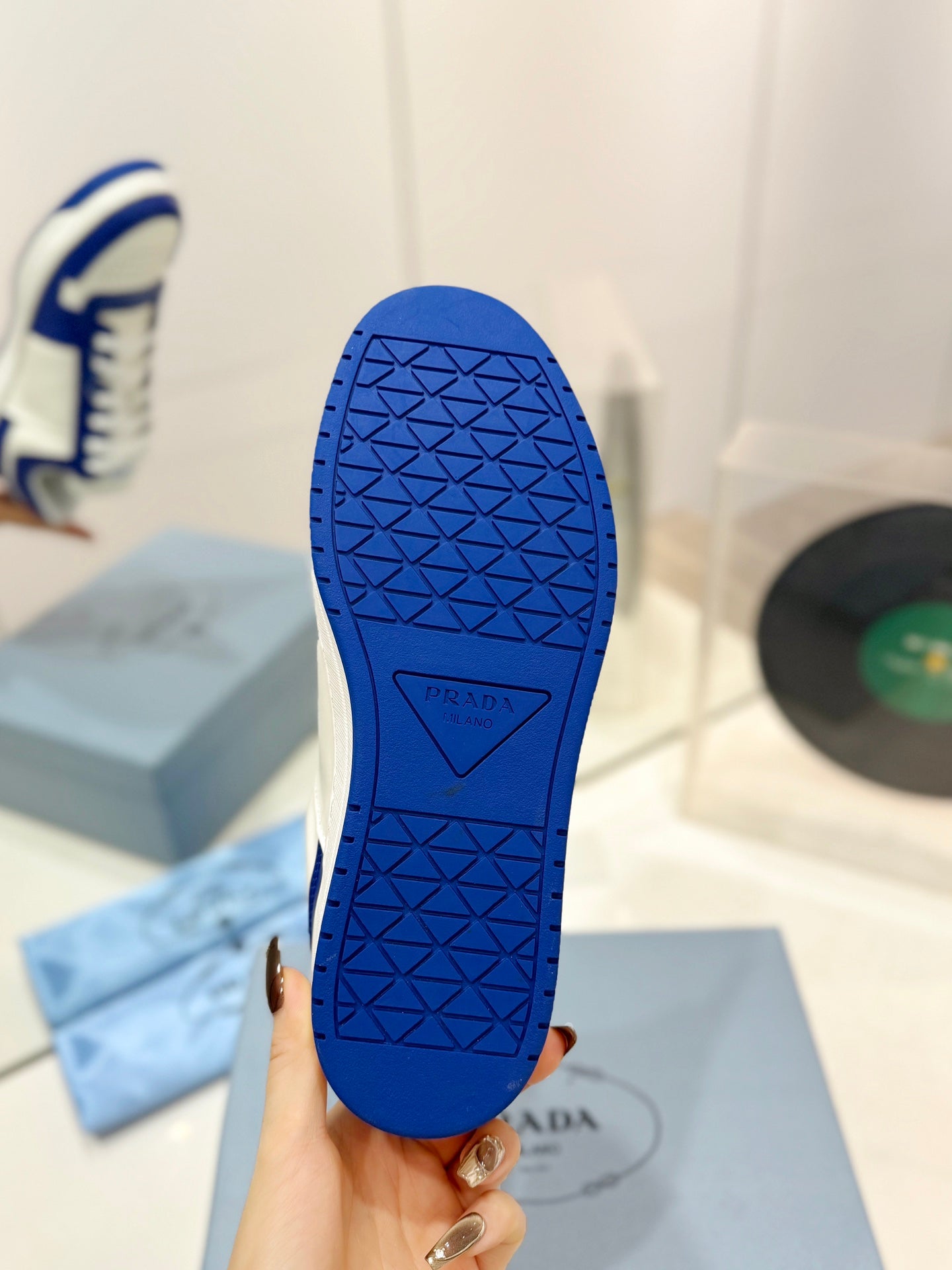 PRADA DOWNTOWN PERFORATED SNEAKERS WHITE AND COBALT CALFSKIN