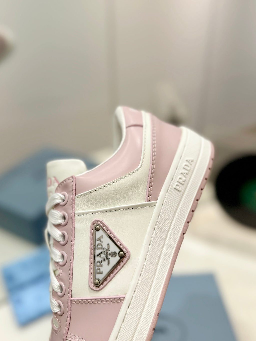 PRADA DOWNTOWN PERFORATED SNEAKERS WHITE AND BLUSH CALFSKIN
