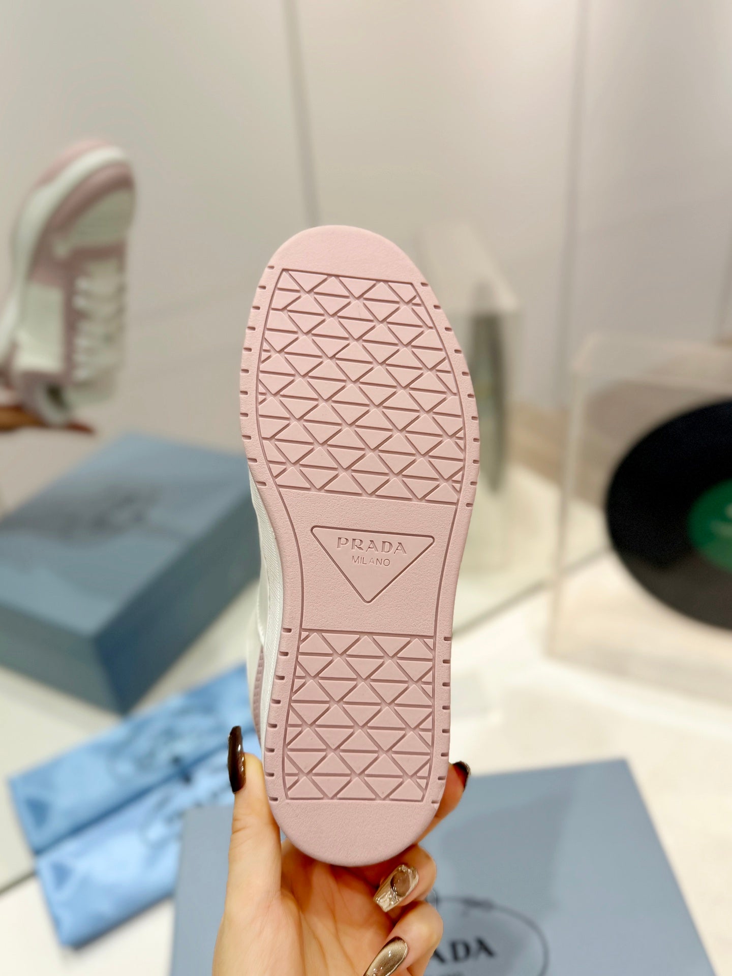 PRADA DOWNTOWN PERFORATED SNEAKERS WHITE AND BLUSH CALFSKIN