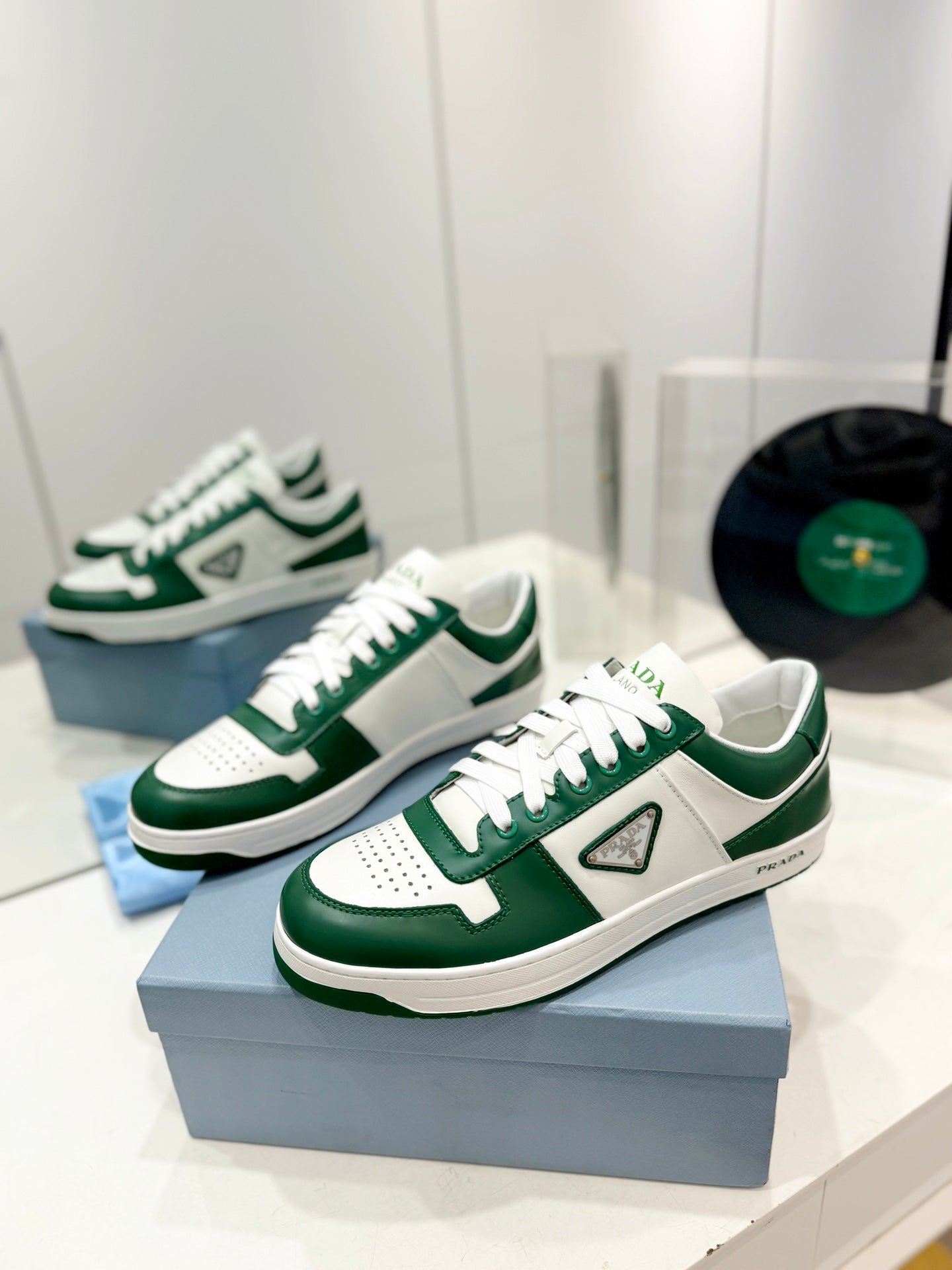 PRADA DOWNTOWN PERFORATED SNEAKERS WHITE AND GREEN CALFSKIN