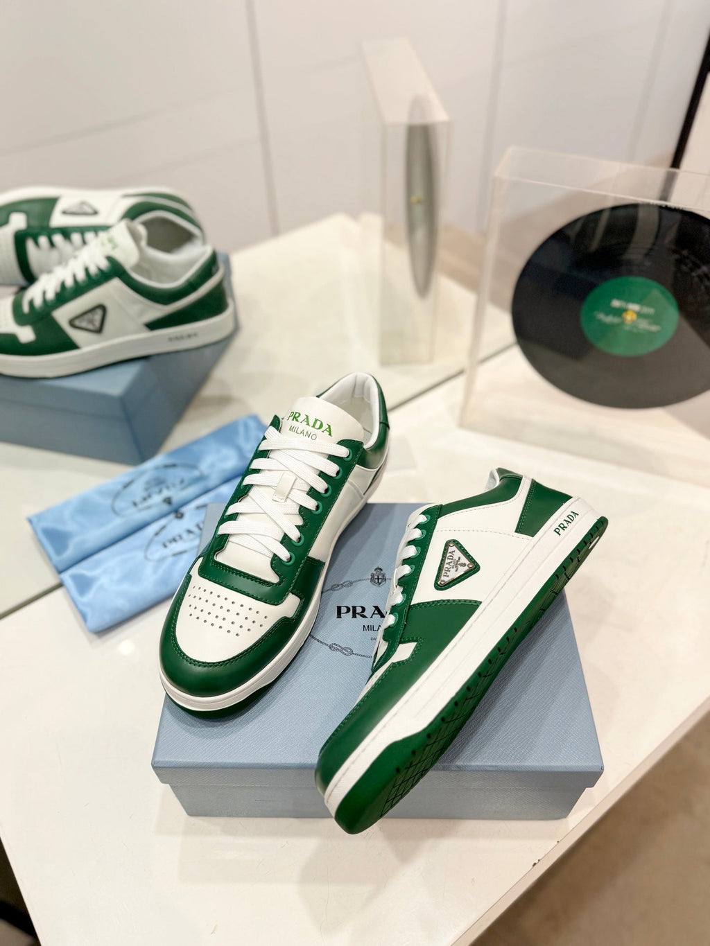 PRADA DOWNTOWN PERFORATED SNEAKERS WHITE AND GREEN CALFSKIN