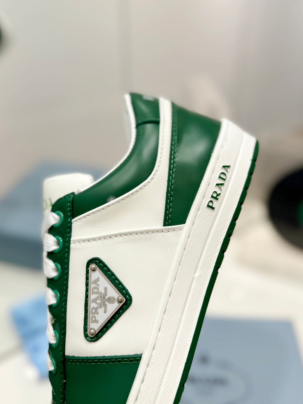 PRADA DOWNTOWN PERFORATED SNEAKERS WHITE AND GREEN CALFSKIN