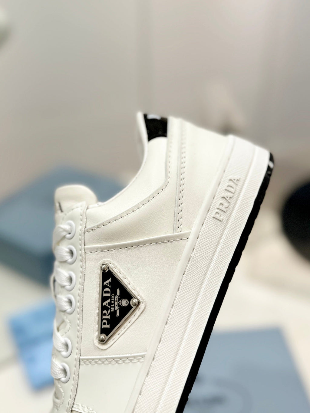 PRADA DOWNTOWN PERFORATED SNEAKERS WHITE AND BLACK LOGO CALFSKIN