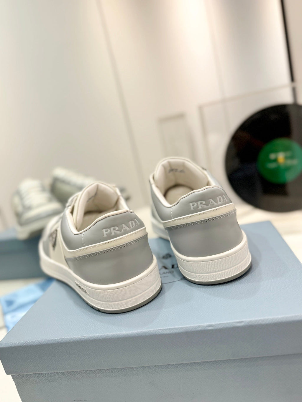 PRADA DOWNTOWN PERFORATED SNEAKERS WHITE AND GRAY CALFSKIN