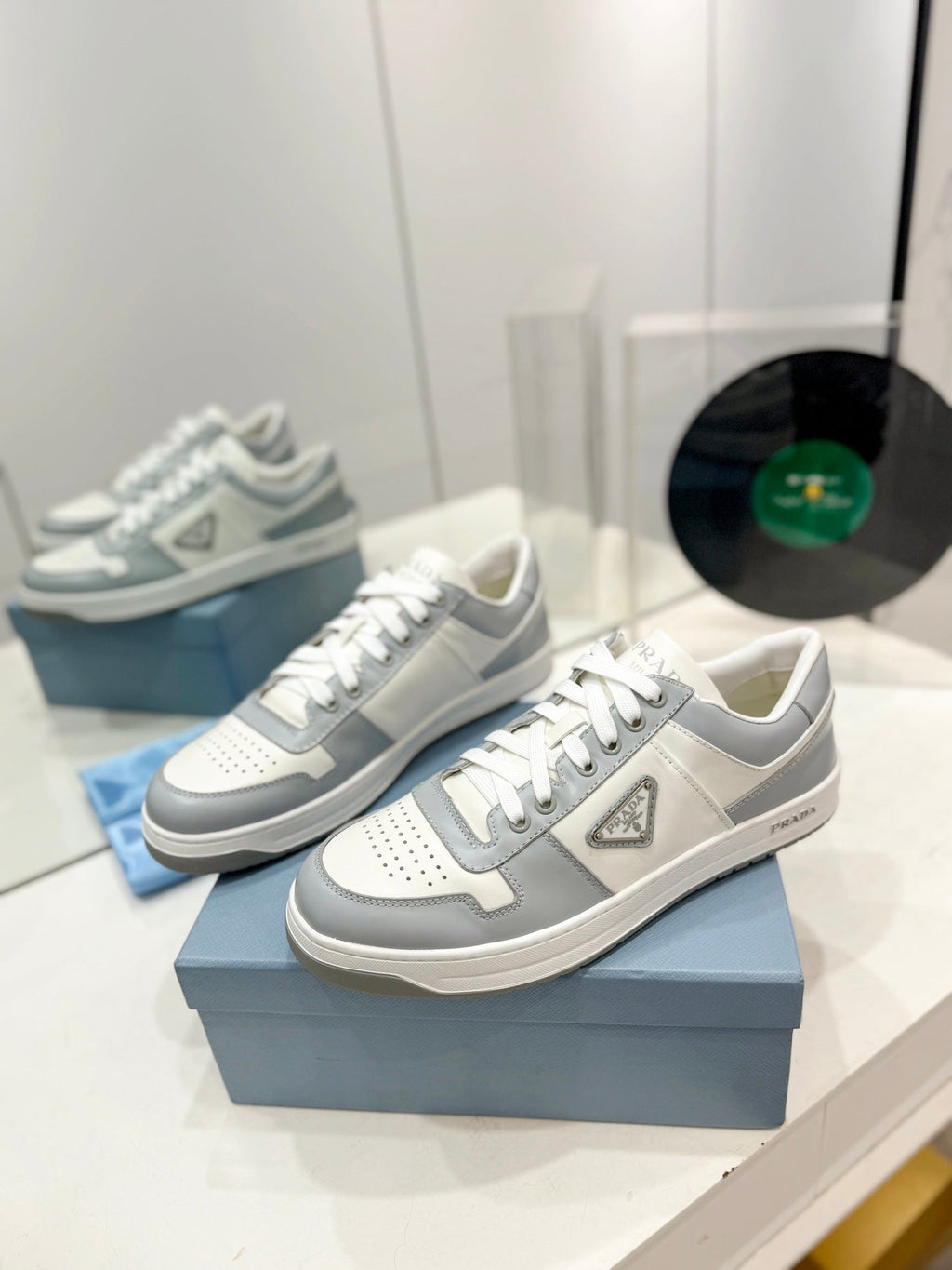 PRADA DOWNTOWN PERFORATED SNEAKERS WHITE AND GRAY CALFSKIN