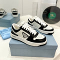PRADA DOWNTOWN PERFORATED SNEAKERS BLACK AND WHITE CALFSKIN
