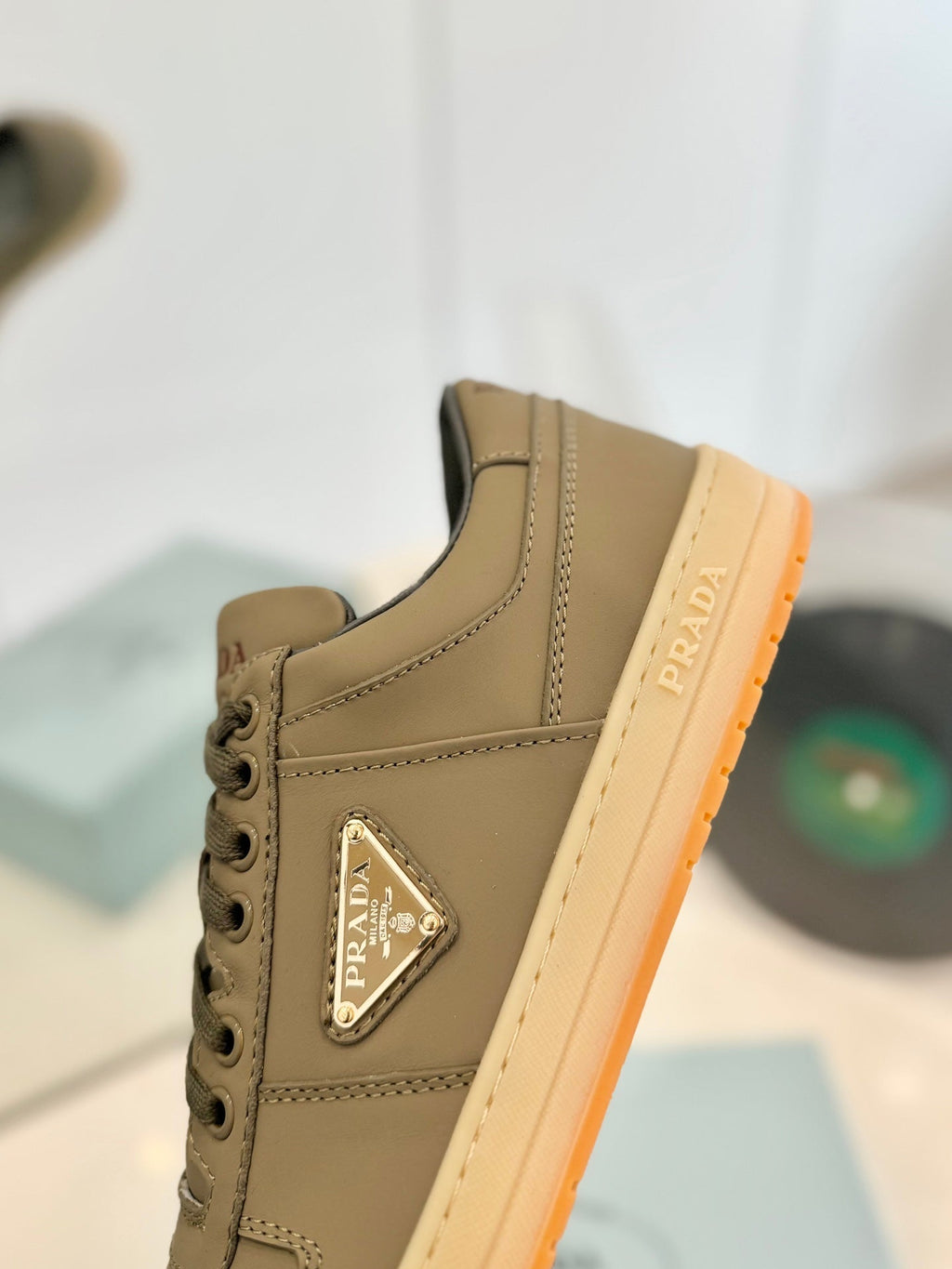 PRADA DOWNTOWN PERFORATED SNEAKERS OLIVE CALFSKIN