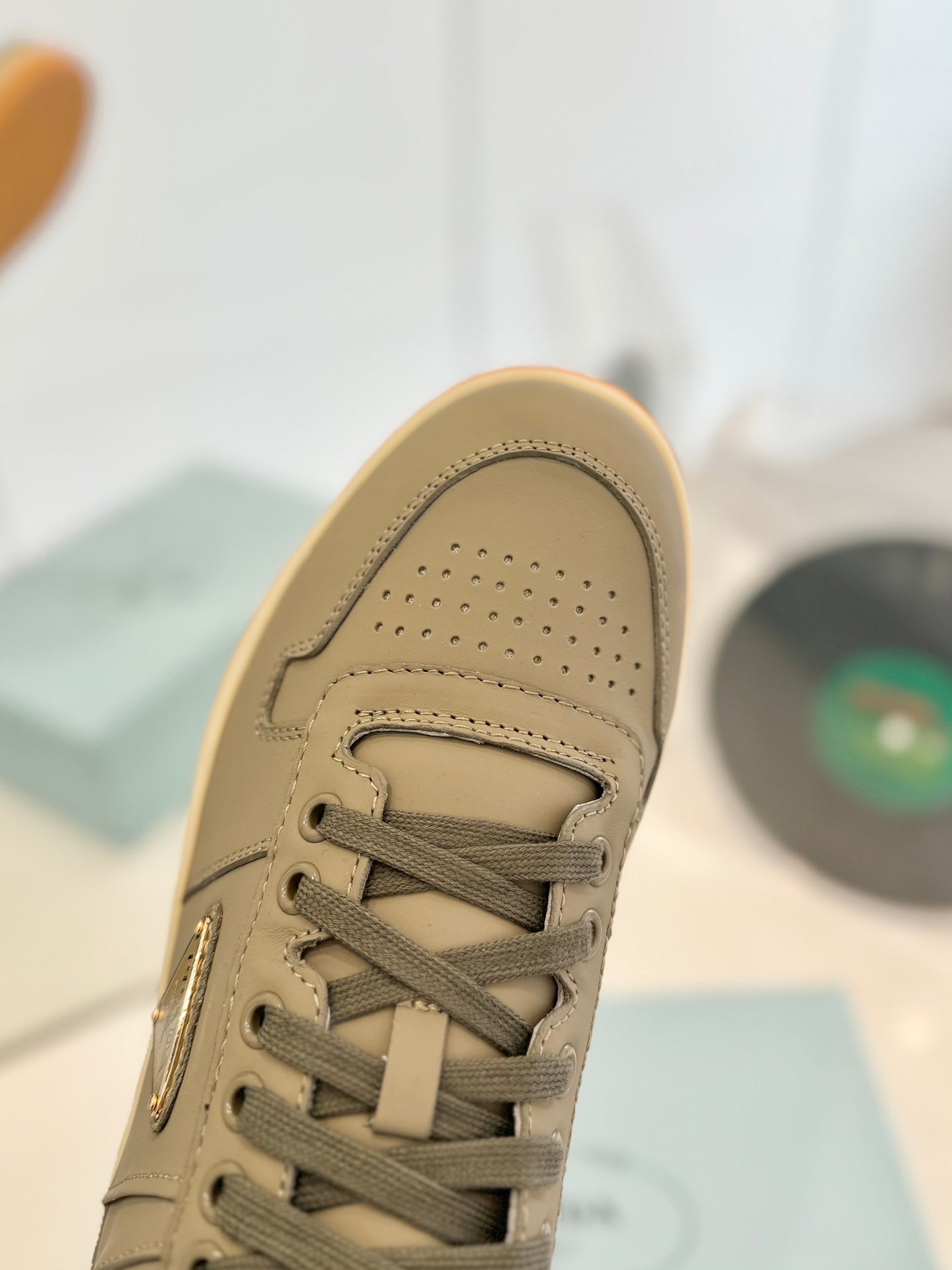 PRADA DOWNTOWN PERFORATED SNEAKERS OLIVE CALFSKIN