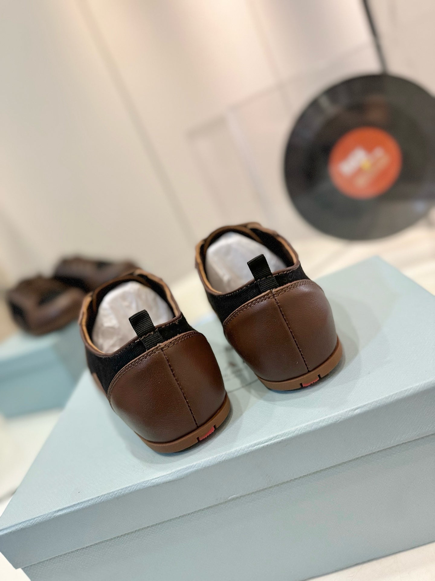 PRADA SNEAKERS IN BROWN LAMBSKIN AND BLACK CANVAS