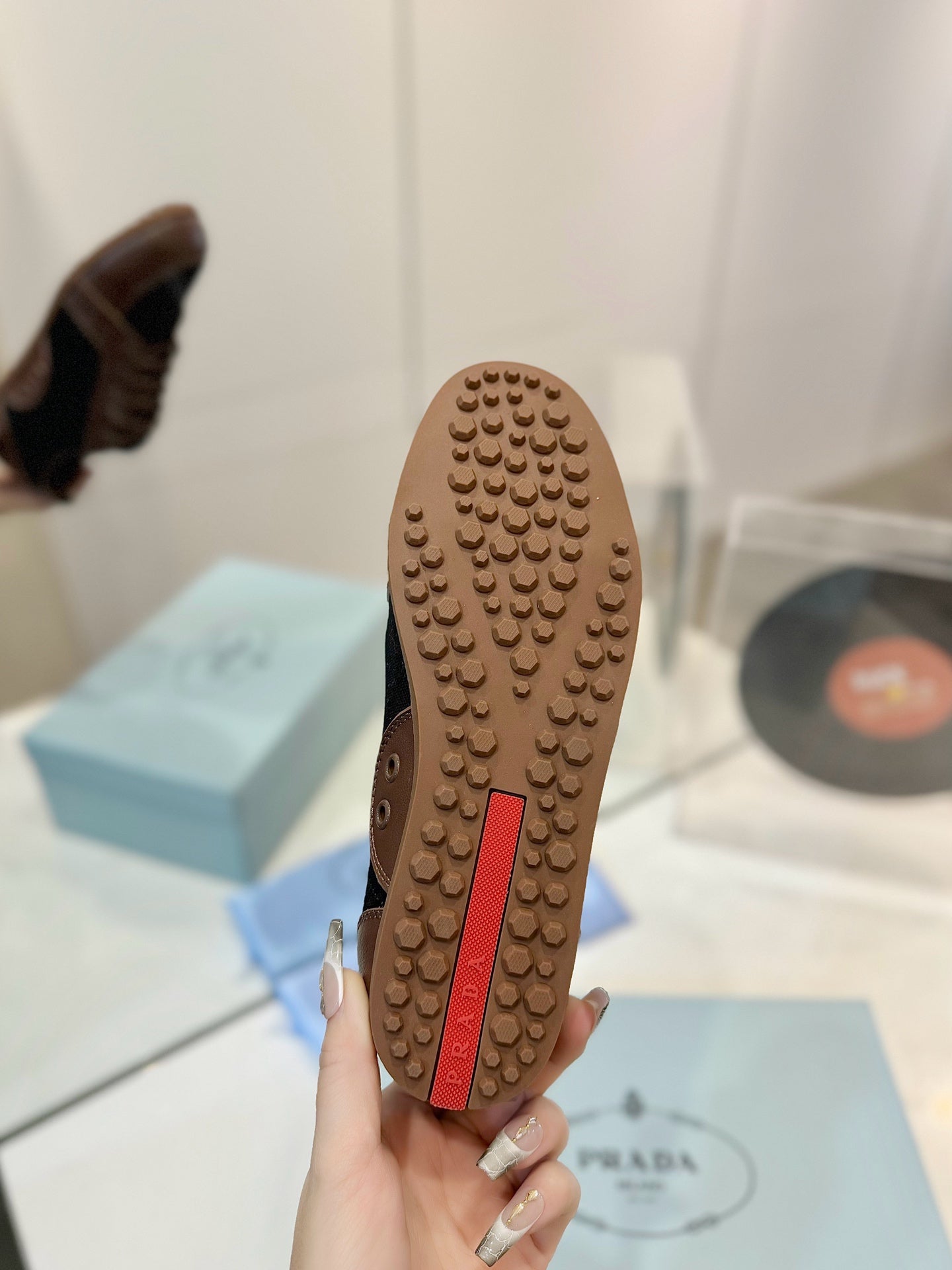 PRADA SNEAKERS IN BROWN LAMBSKIN AND BLACK CANVAS