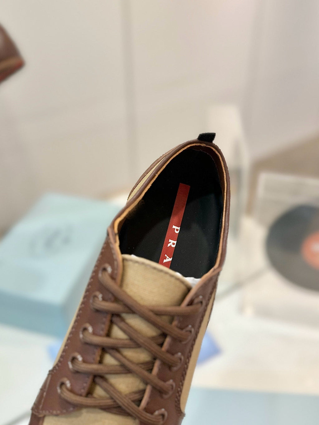PRADA SNEAKERS IN BROWN LAMBSKIN AND BEIGE CANVAS