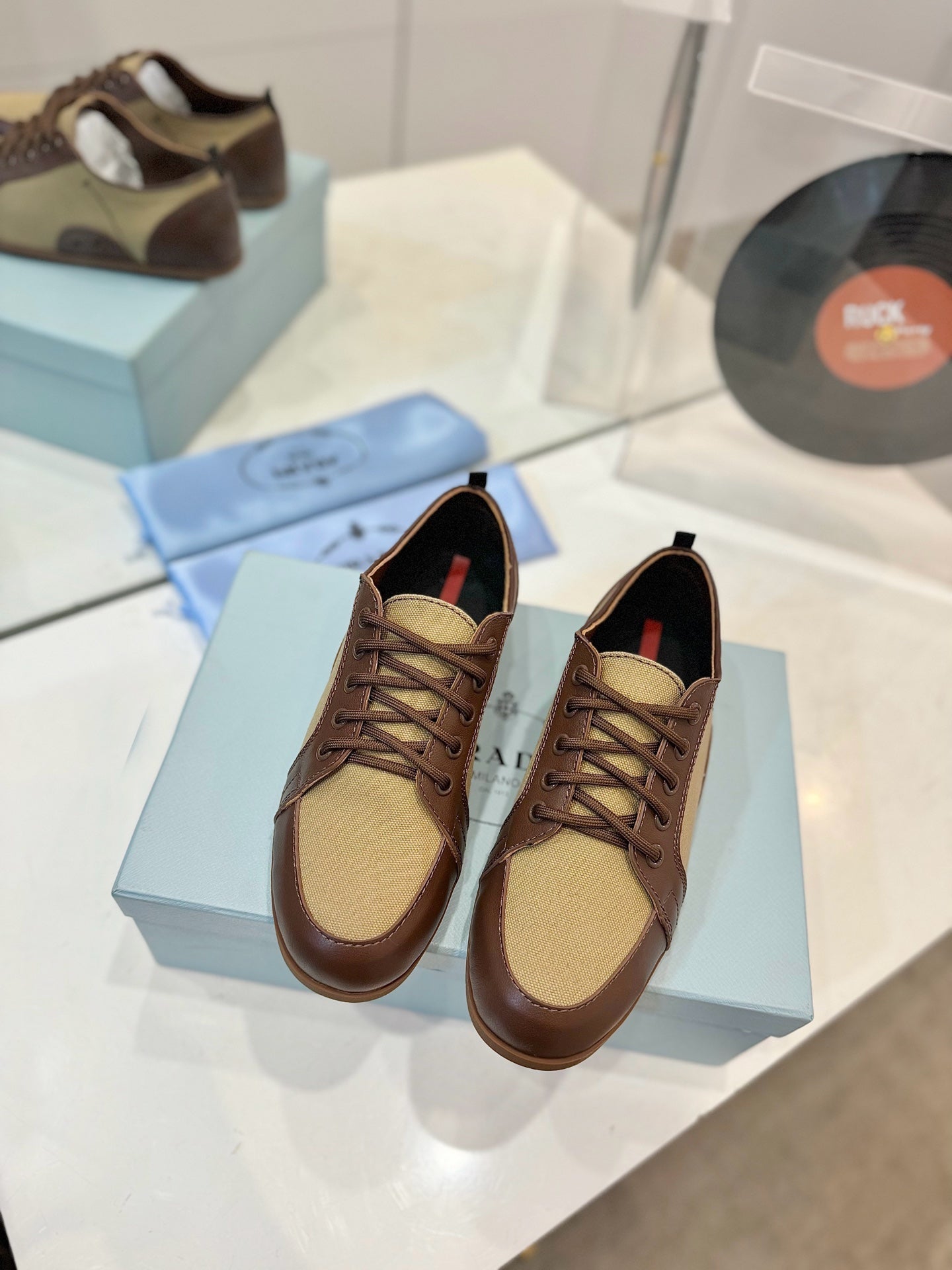 PRADA SNEAKERS IN BROWN LAMBSKIN AND BEIGE CANVAS