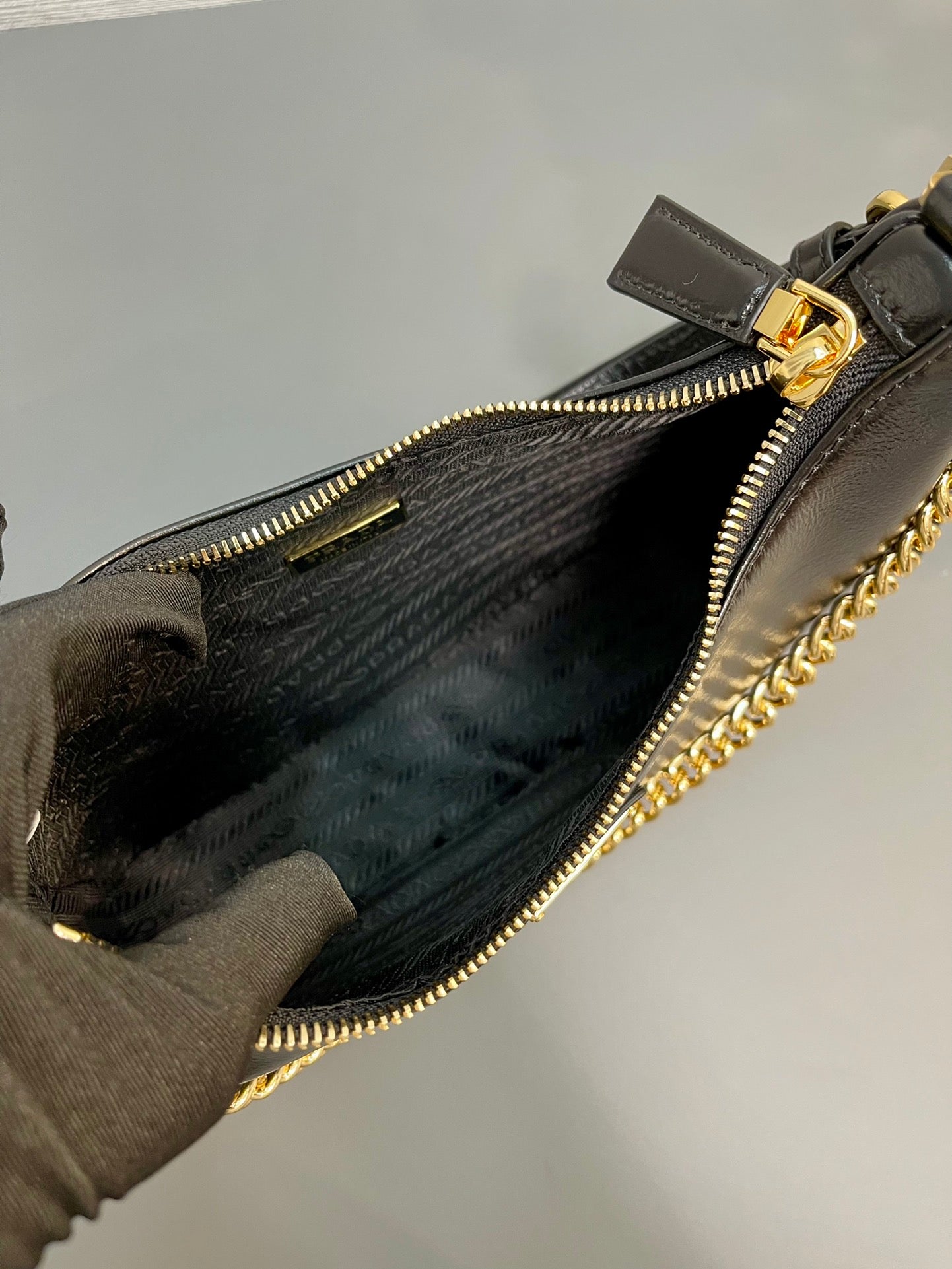 PRADA HOBO BAG 23 IN BLACK PATENT NAPPA LAMBSKIN GOLD HARDWARE