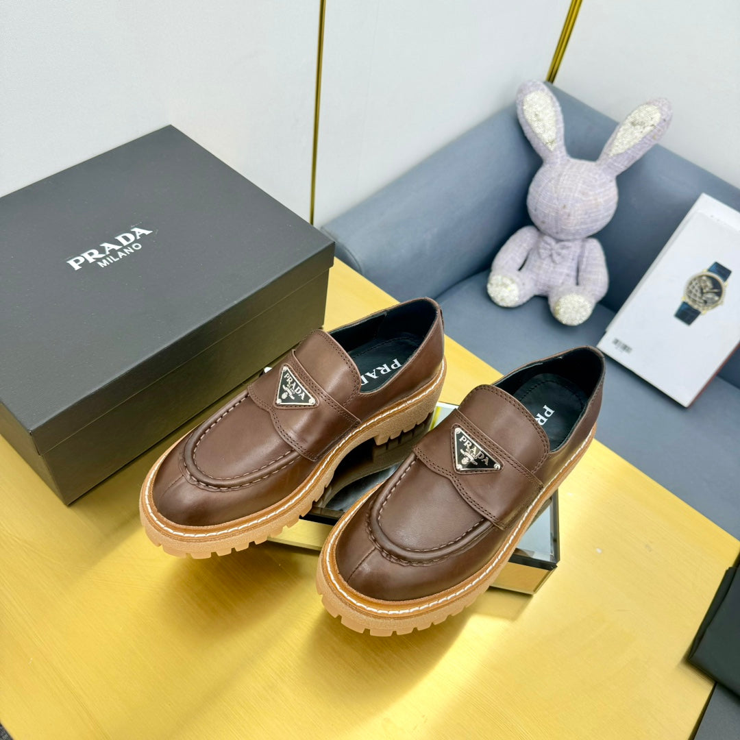 PRADA LOAFER WITH TRIANGLE LOGO IN CHOCOLATE BROWN CALFSKIN