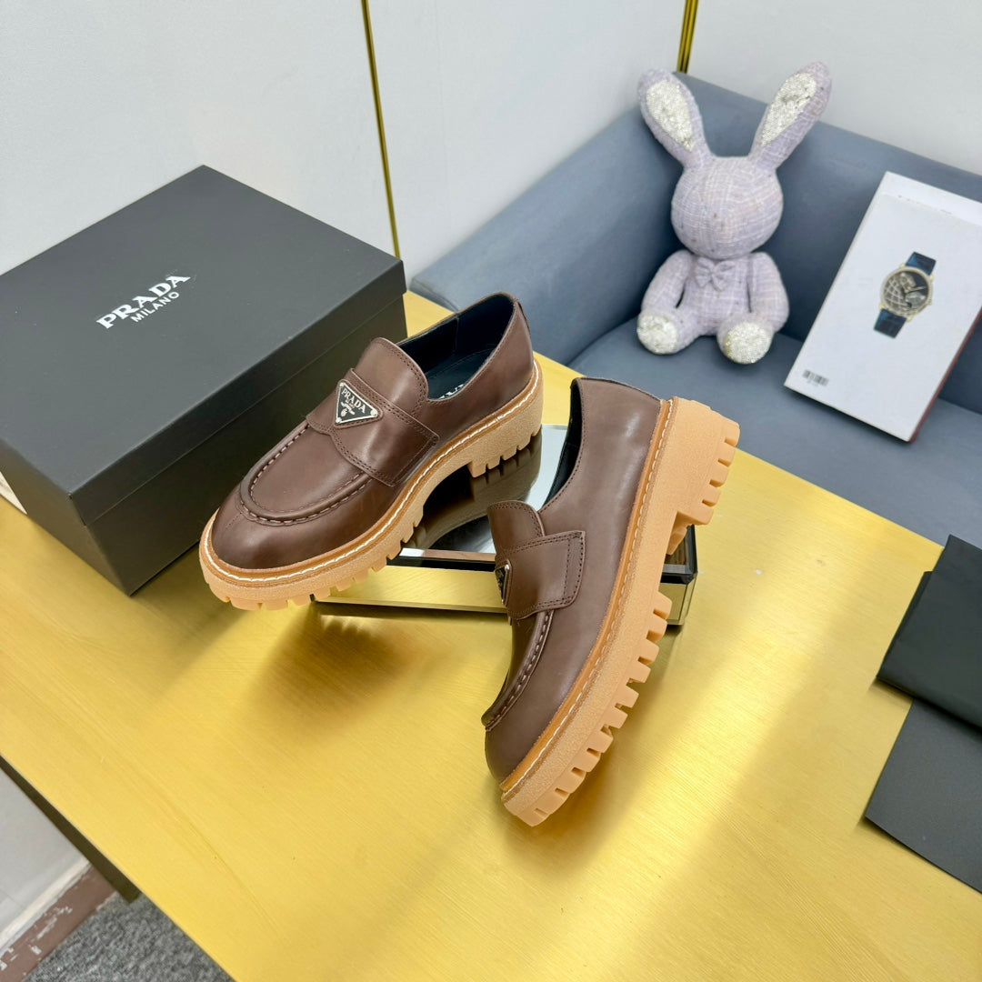 PRADA LOAFER WITH TRIANGLE LOGO IN CHOCOLATE BROWN CALFSKIN