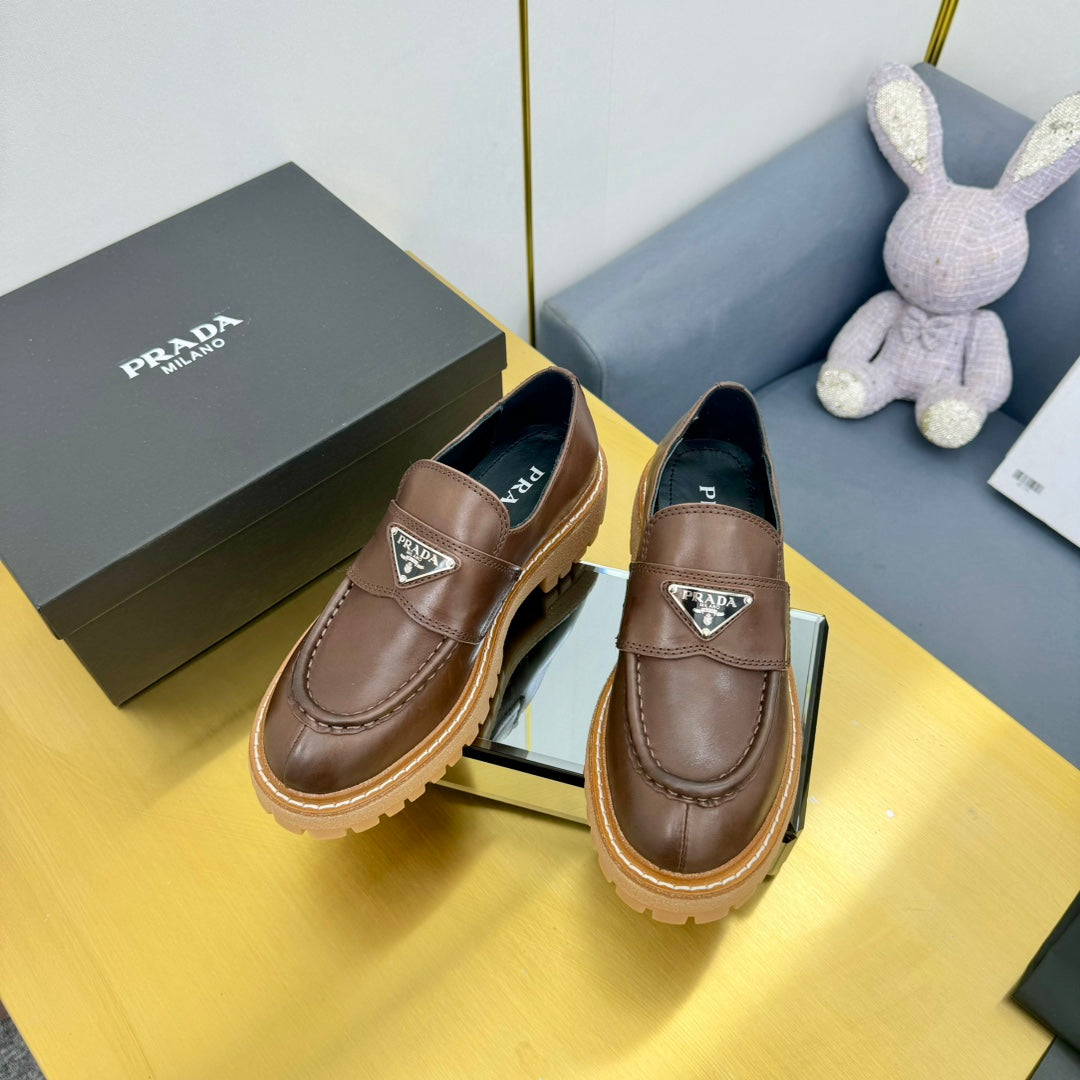 PRADA LOAFER WITH TRIANGLE LOGO IN CHOCOLATE BROWN CALFSKIN