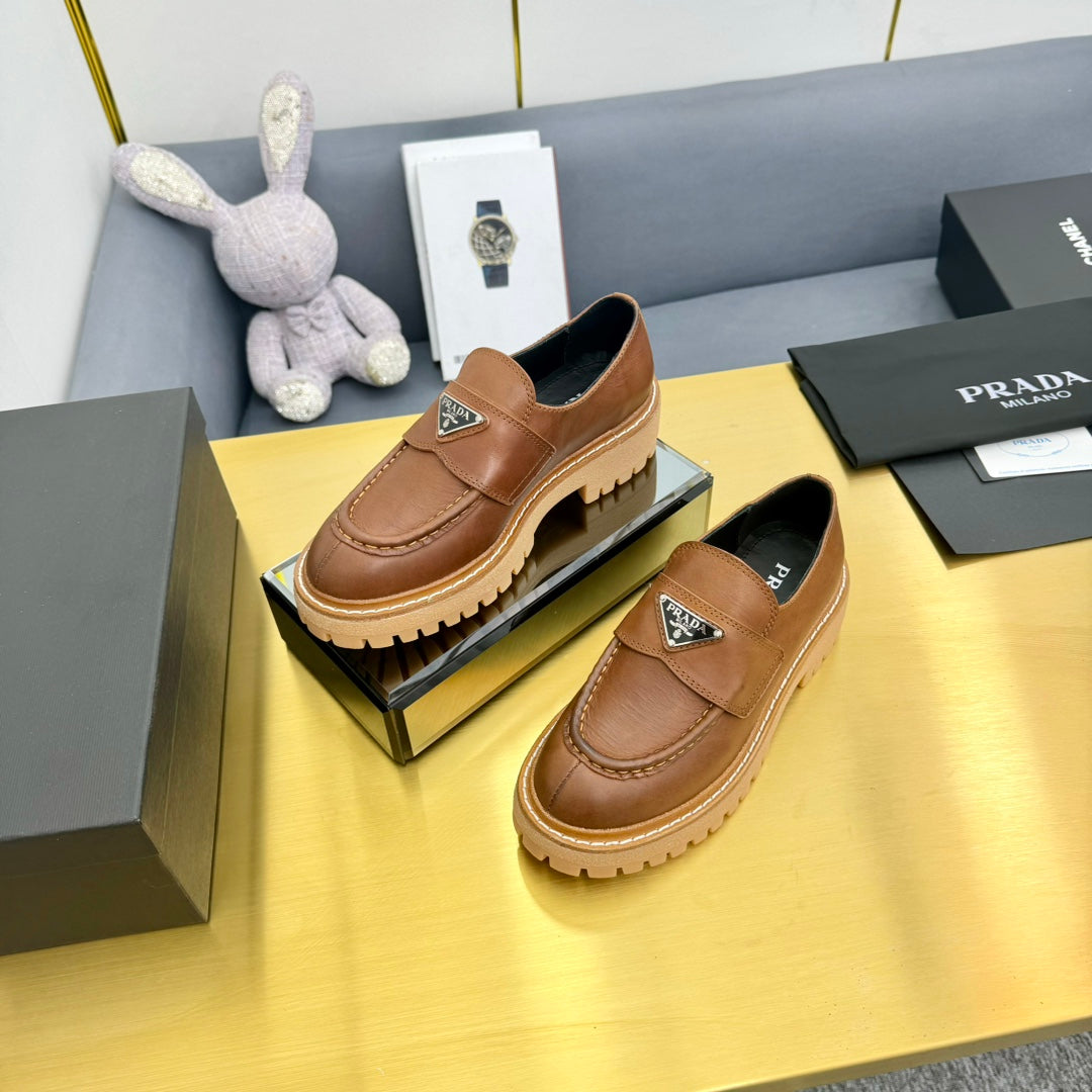 PRADA LOAFER WITH TRIANGLE LOGO IN COGNAC CALFSKIN