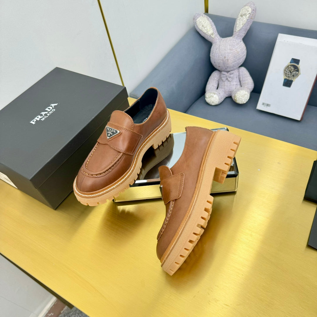 PRADA LOAFER WITH TRIANGLE LOGO IN COGNAC CALFSKIN