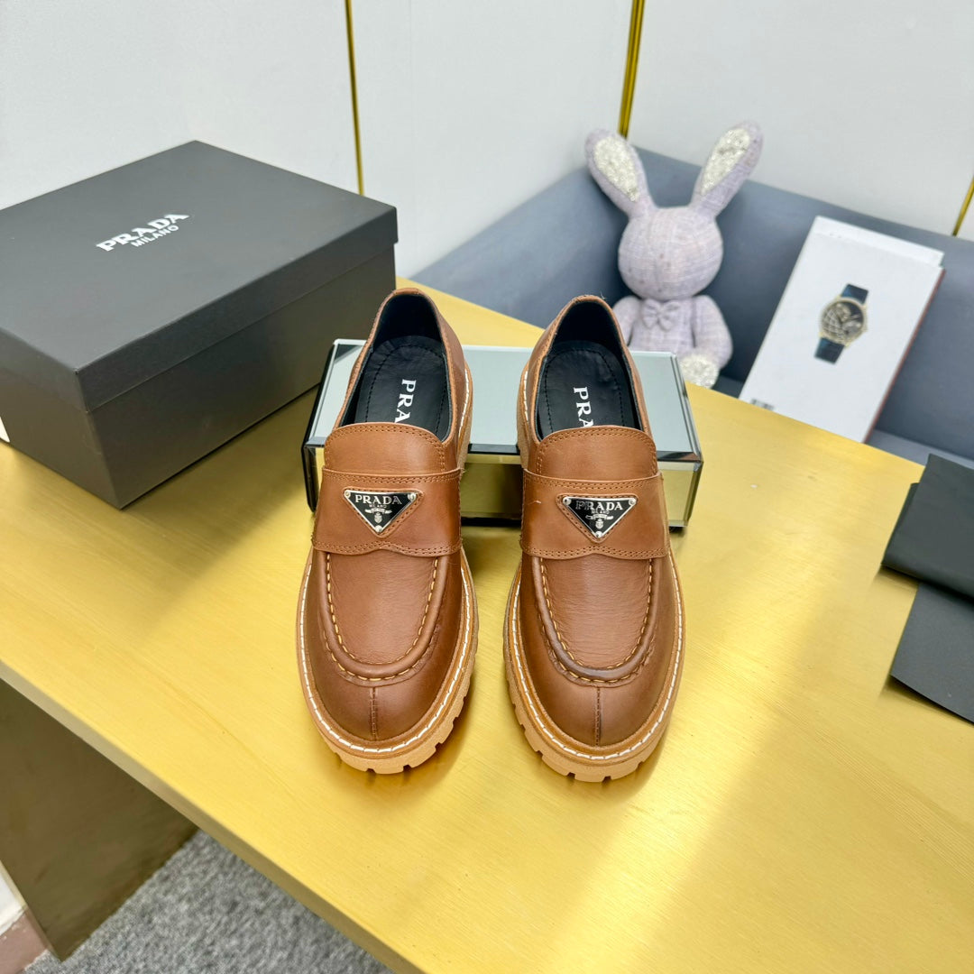 PRADA LOAFER WITH TRIANGLE LOGO IN COGNAC CALFSKIN