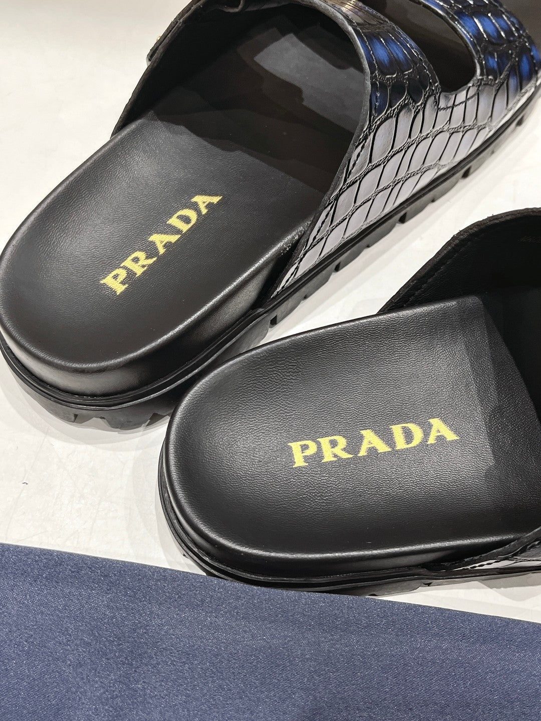 PRADA CROCODILE MOTIF STRAP SLIDES SANLS BLACK AND LAPIS CALFSKIN