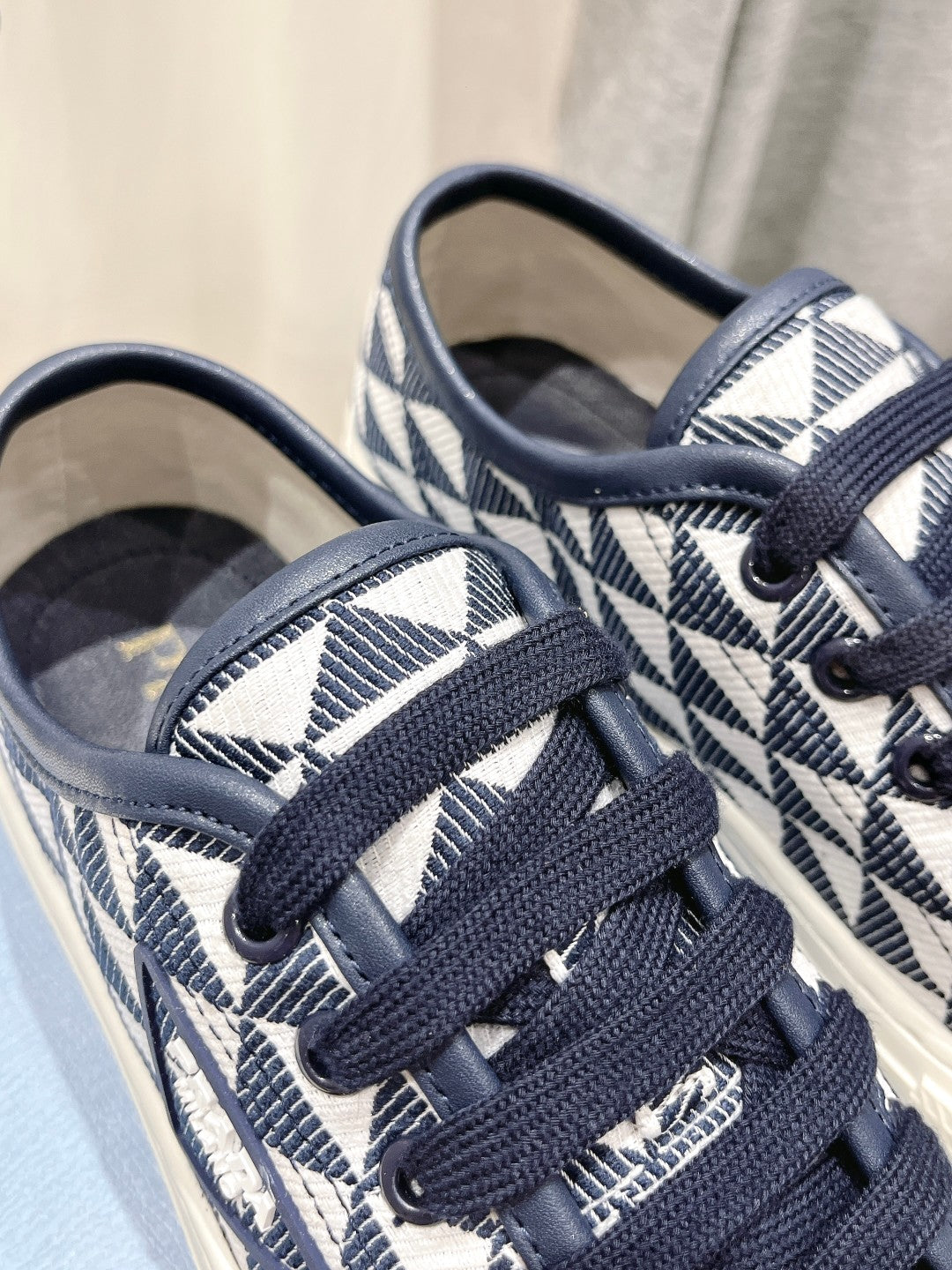 PRADA PRINTED COTTON SNEAKERS WHITE AND BLACK TRIANGLE CANVAS